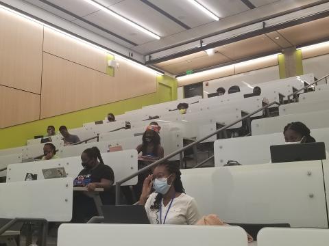 Students look on in a Challenge computer science class