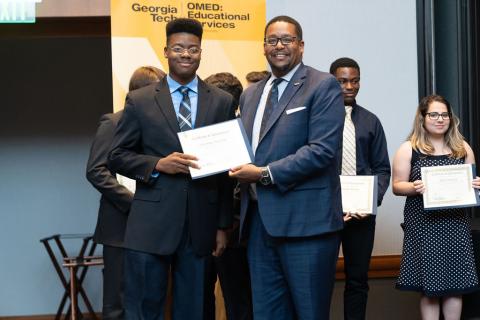 S. Gordon Moore Jr. and 2019 Challenge participant Lawrence Williams at the program's closing banquet